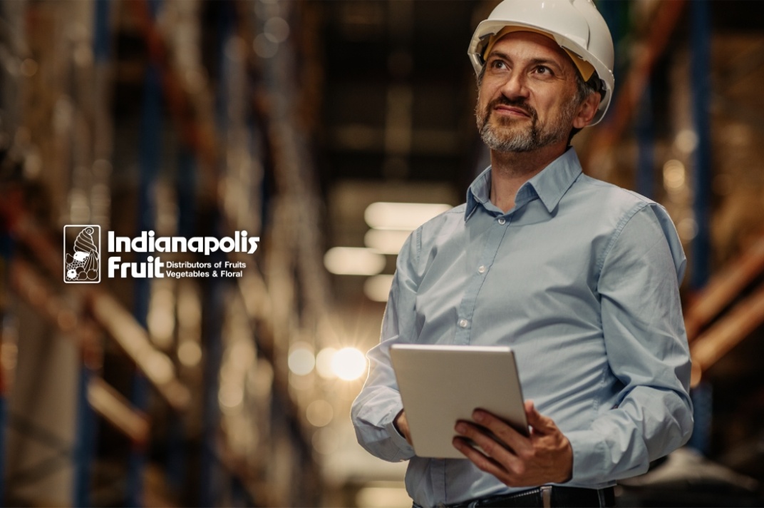 Indianapolis Fruit - Man Holding Tablet