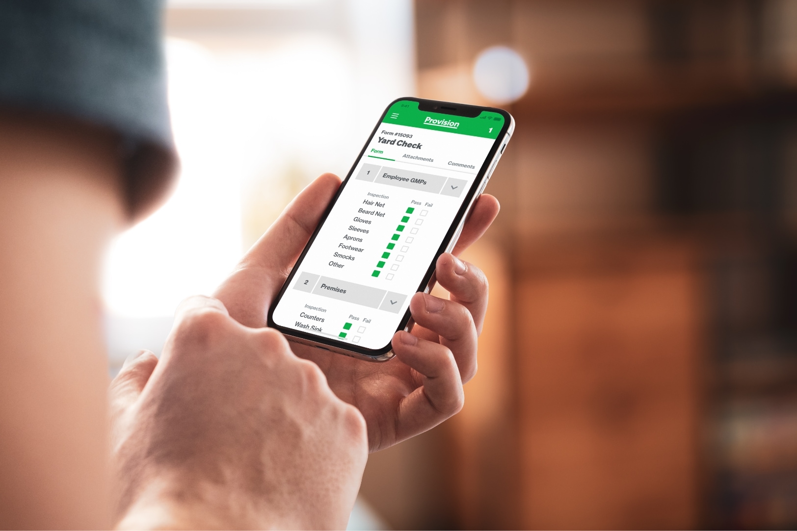 pic-people-hand-holding-phone-with-provision-yard-check-form-in-warehouse-1624x1083