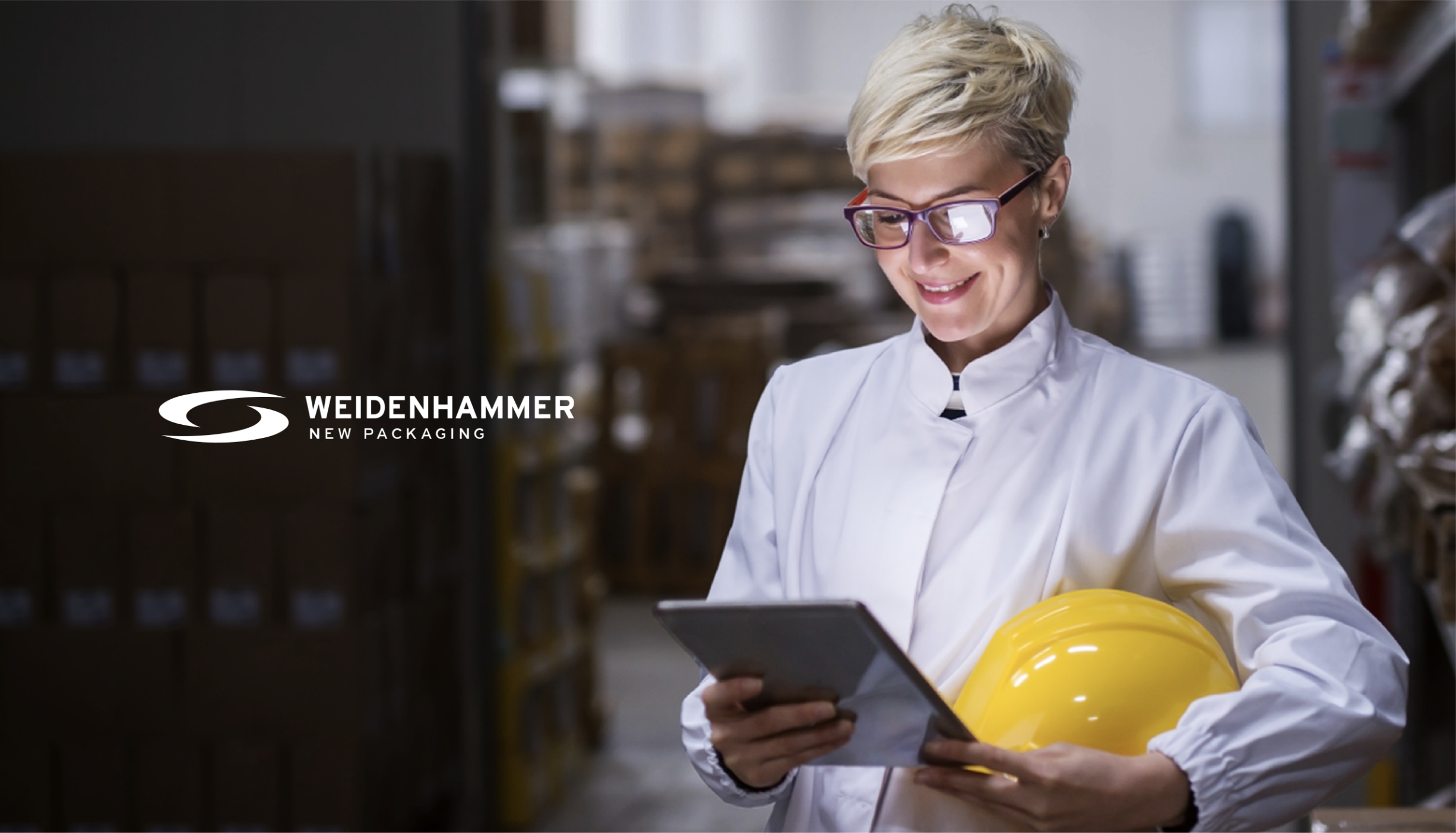 pic-woman-using-tablet-behind-weidenhammer-logo-2452x1402